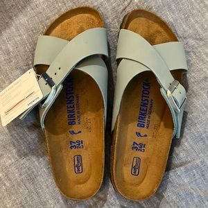 Brand new, Birkenstocks sienna style sandal. Soft footbed in light teal